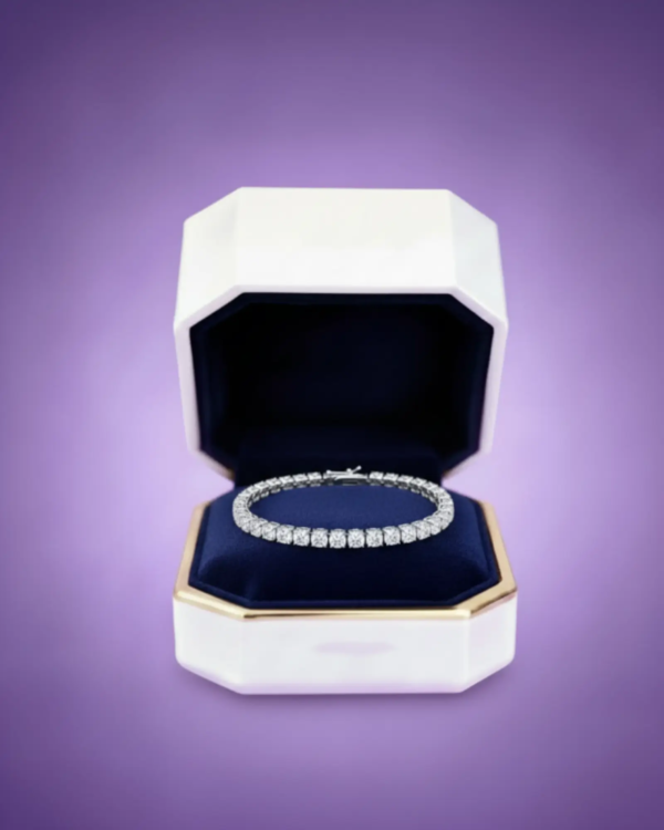 Diamond tennis bracelet presented in an elegant jewelry gift box on lilac background