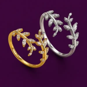 Gold and silver open leaf ring designs with delicate branch detailing
