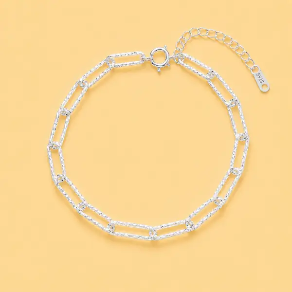Silver paper clip bracelet from the Lumière fine collection.