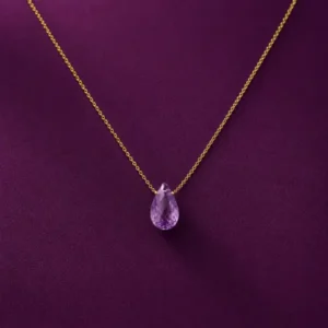 Amethyst gold necklace with teardrop pendant on delicate gold chain part of February birthstone jewelry