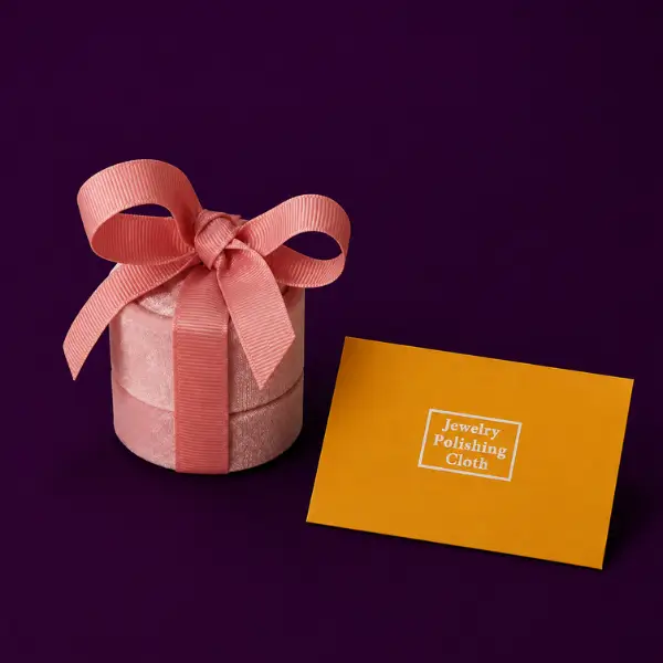 Amethyst solitaire ring gift box with pink ribbon and jewelry polishing cloth